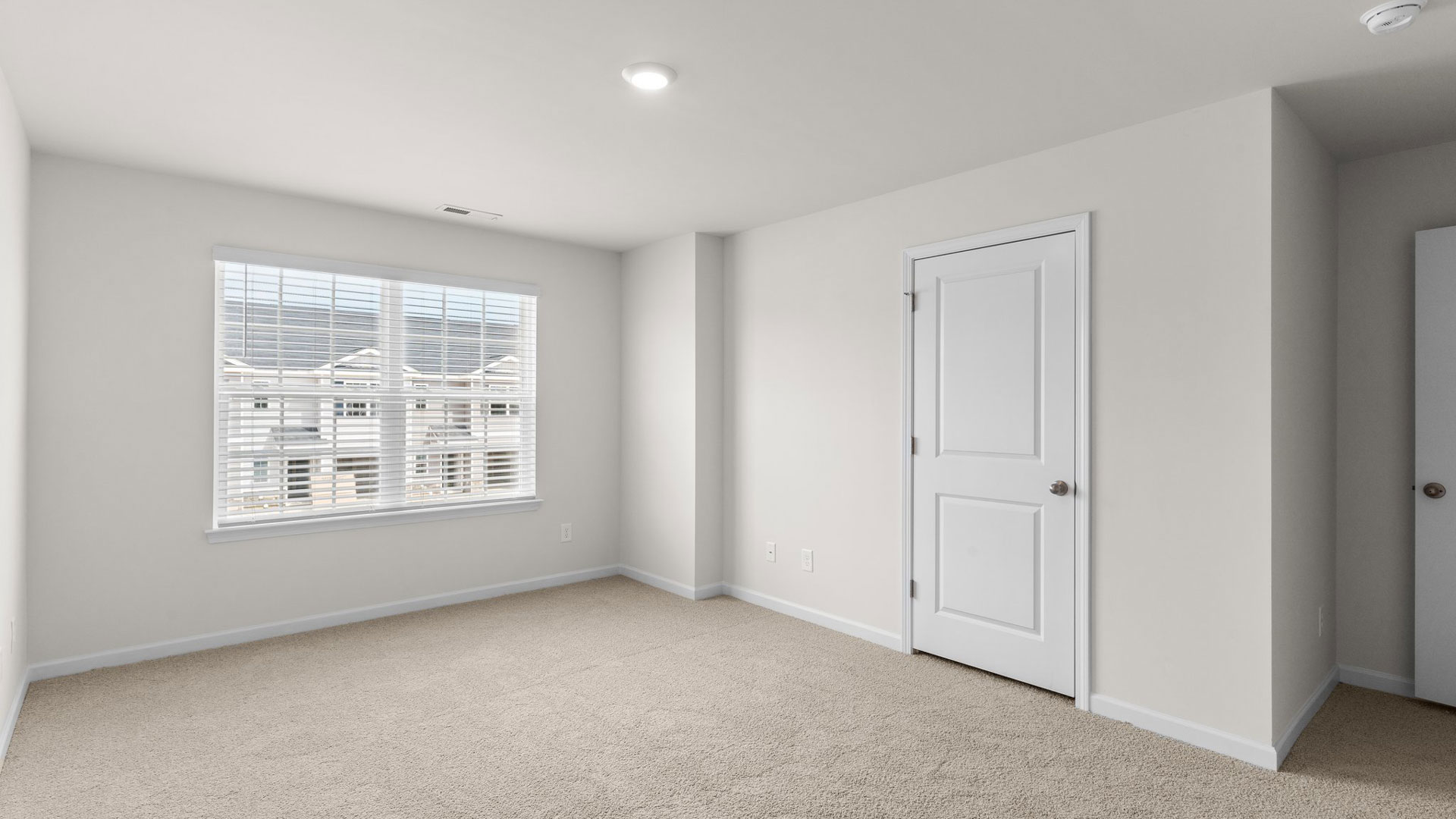 Bedroom with carpet flooring