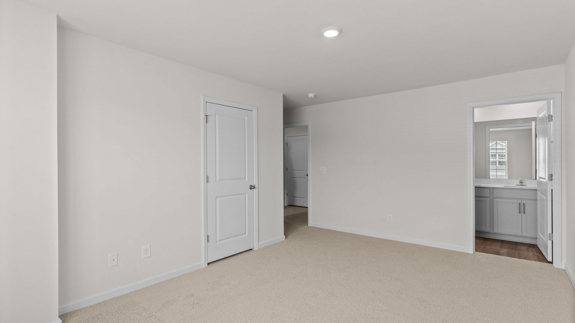 Bedroom with carpet flooring