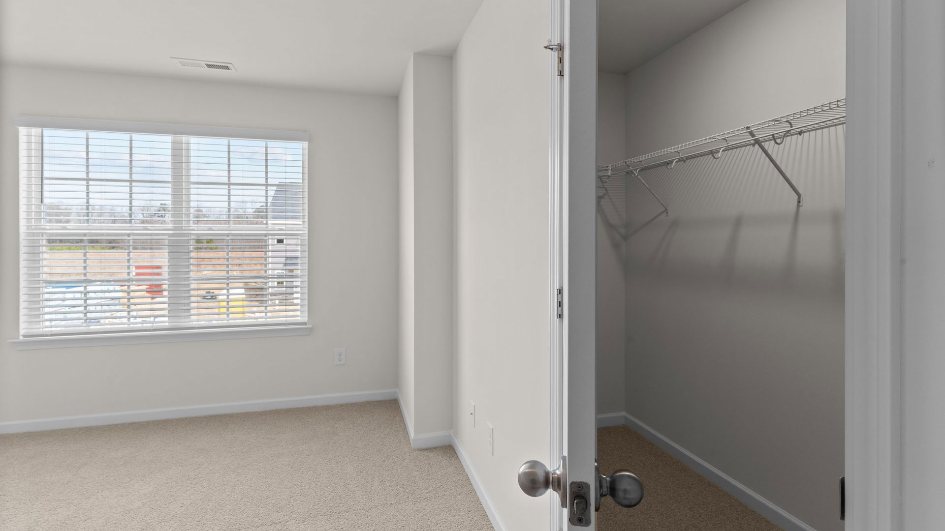 Bedroom with carpet flooring