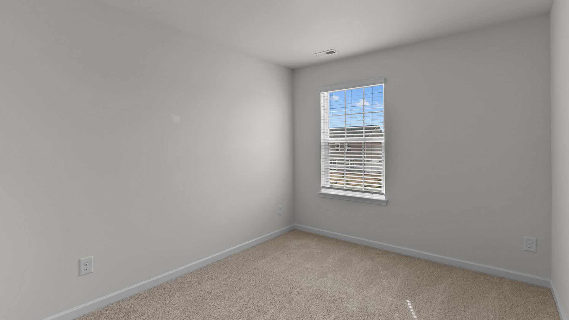 Bedroom with carpet flooring