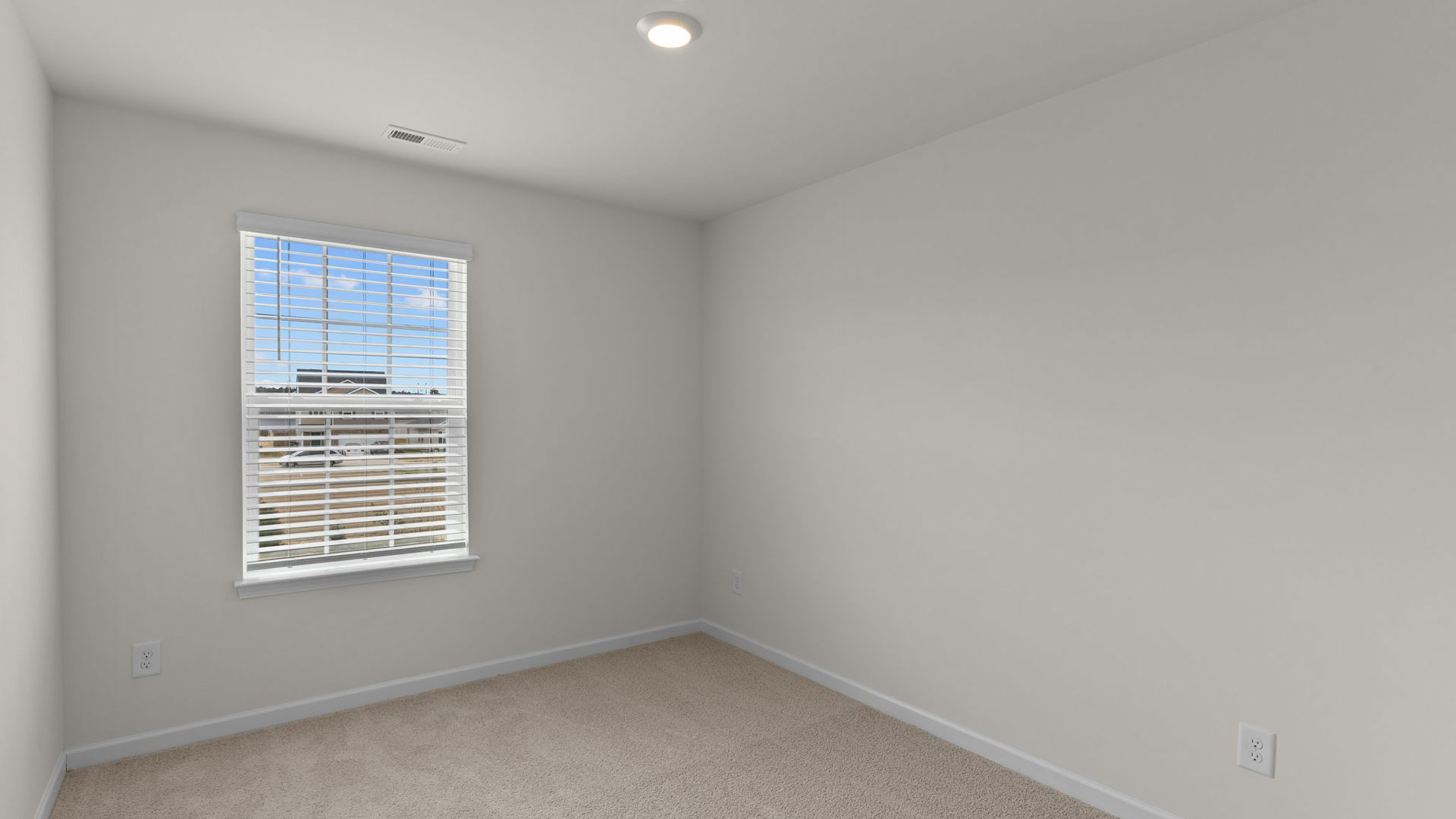 Bedroom with carpet flooring