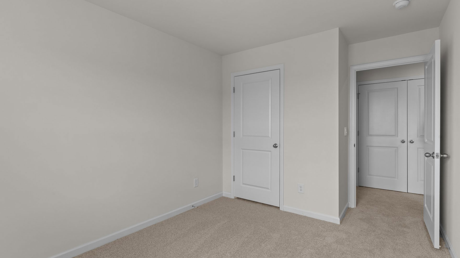 Bedroom with carpet flooring