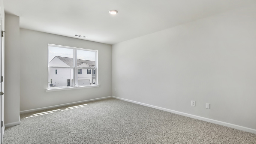 Bedroom with carpet flooring