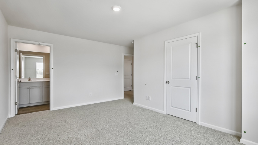 Bedroom with carpet flooring
