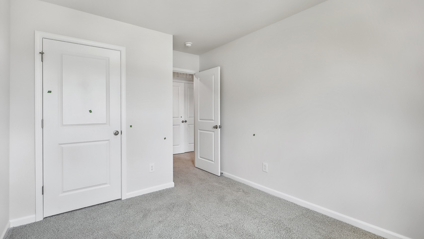 Bedroom with carpet flooring