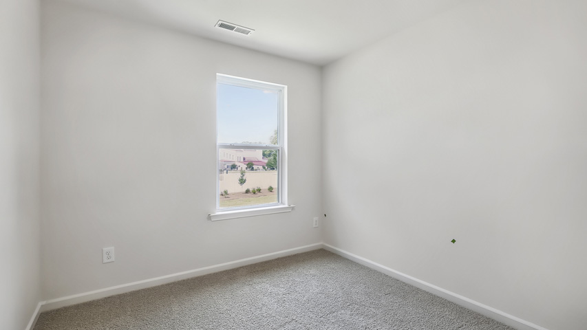 Bedroom with carpet flooring