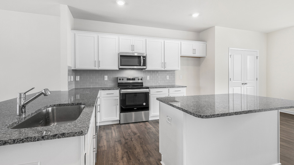 Kitchen with white cabinets