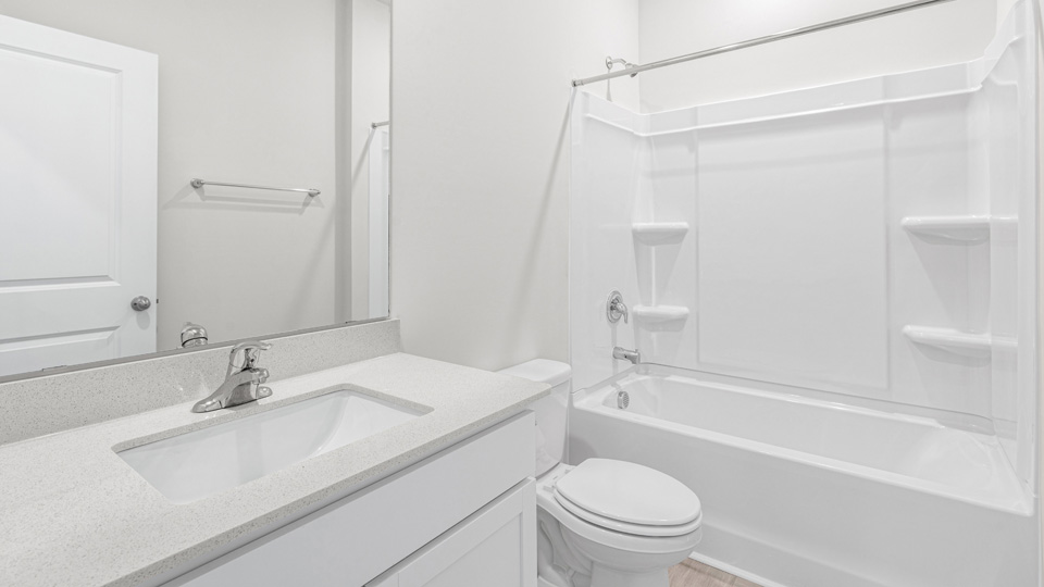 Bathroom with white cabinets