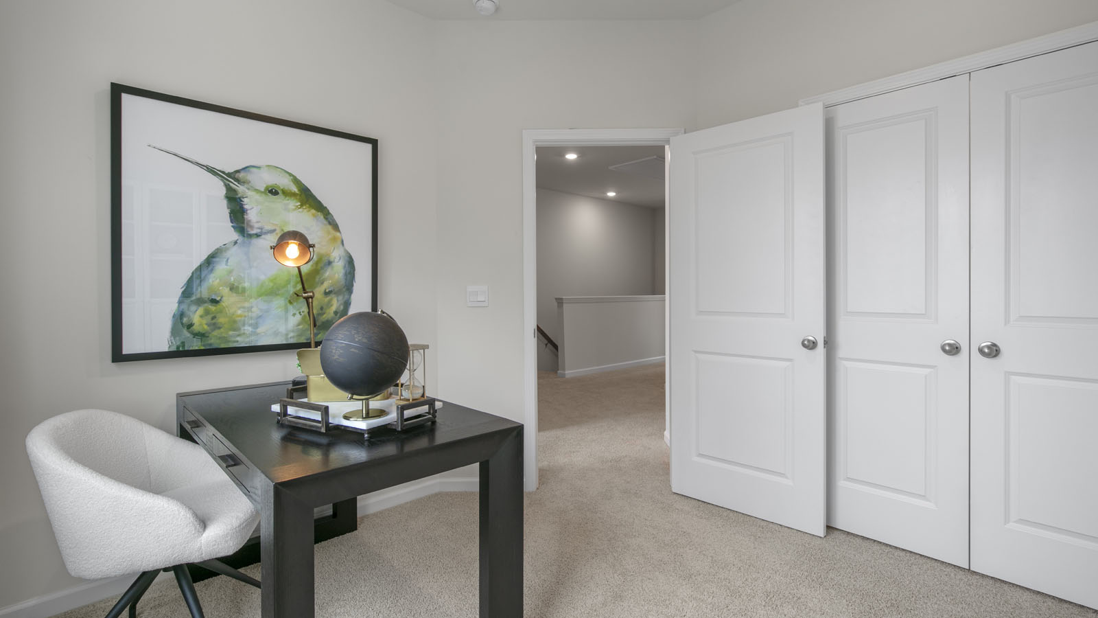 Bedroom with natural lighting and carpet flooring