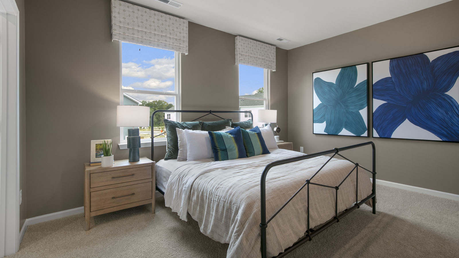 Bedroom with natural lighting and carpet flooring