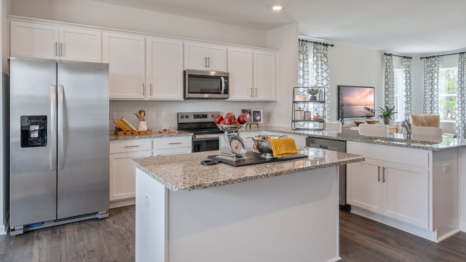 Kitchen with stainless steel appliances and quartz countertops