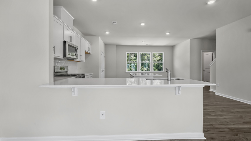 Kitchen with white cabinets
