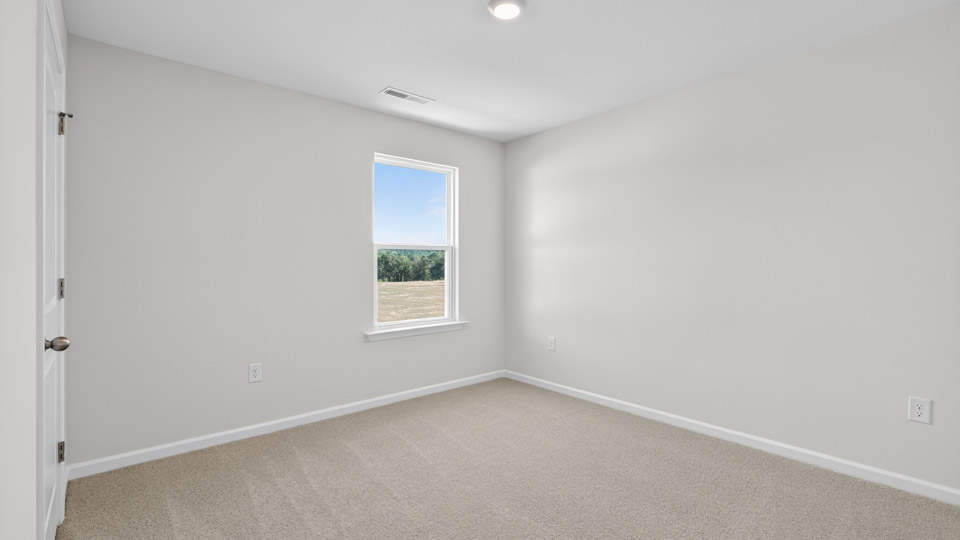 loft with carpet flooring
