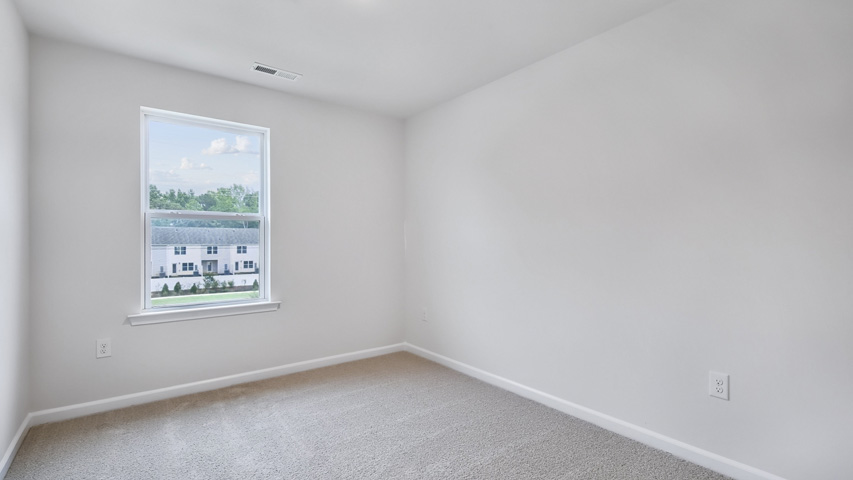 Bedroom with carpet flooring