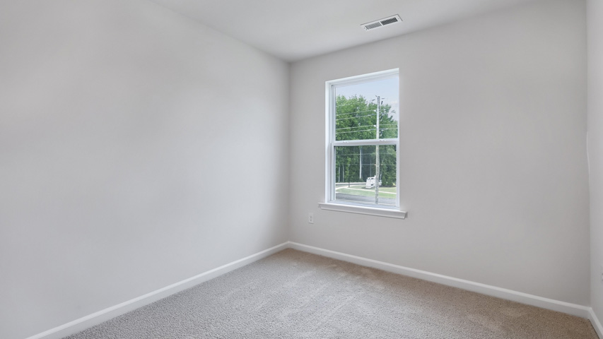 Bedroom with carpet flooring