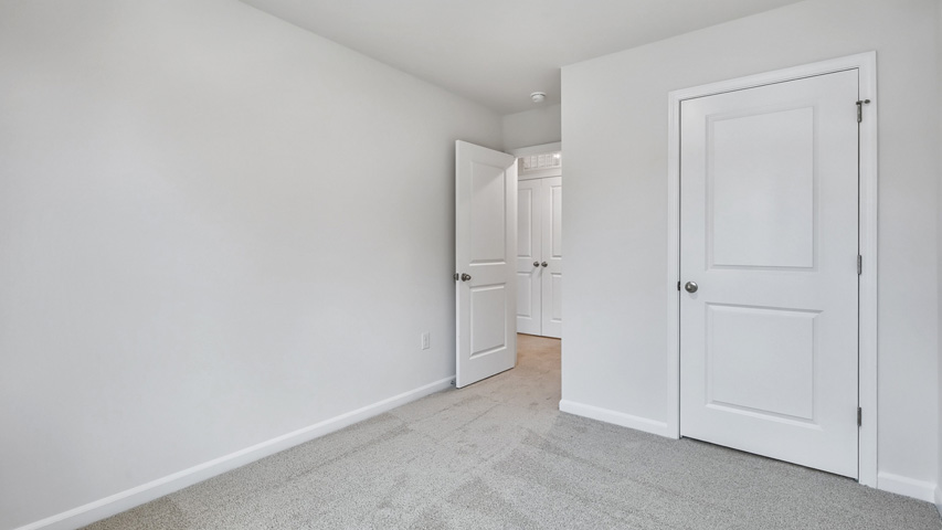 Bedroom with carpet flooring