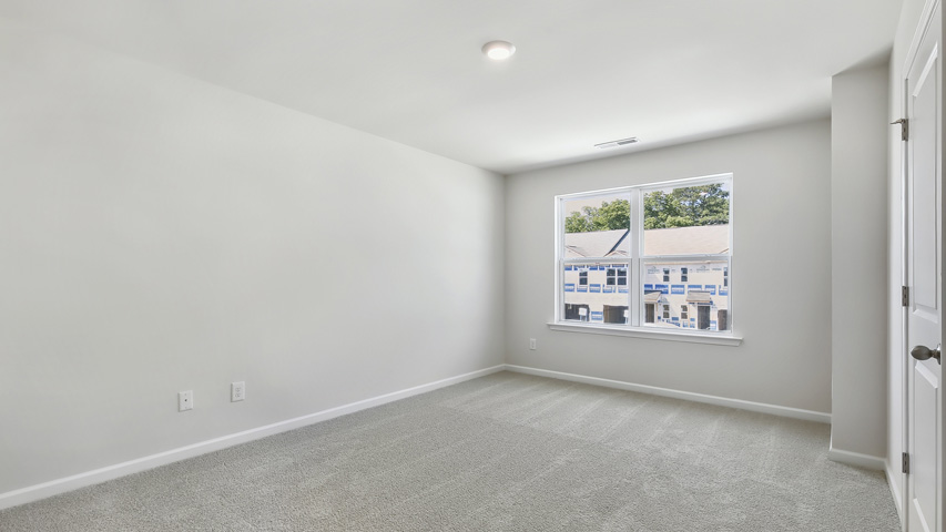 Bedroom with carpet flooring