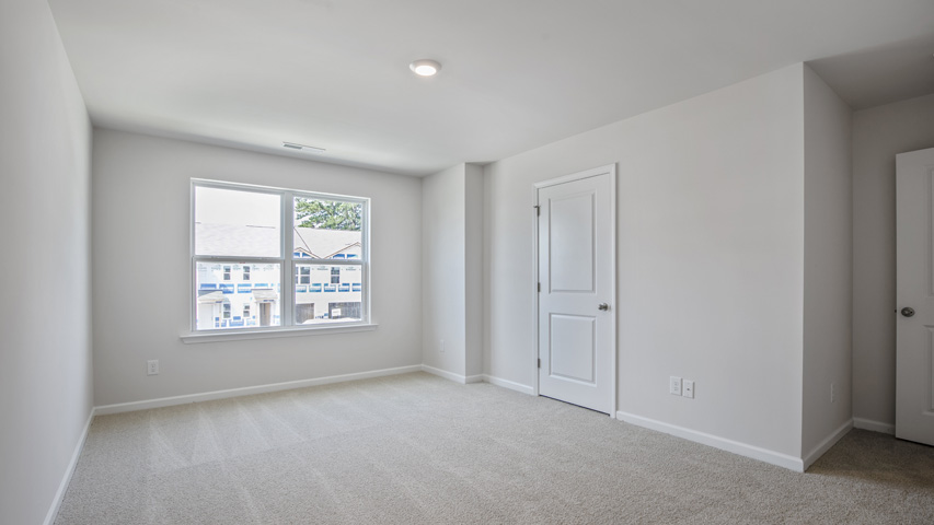 Bedroom with carpet flooring