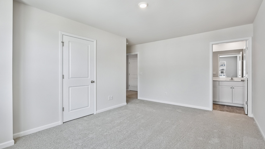 Bedroom with carpet flooring