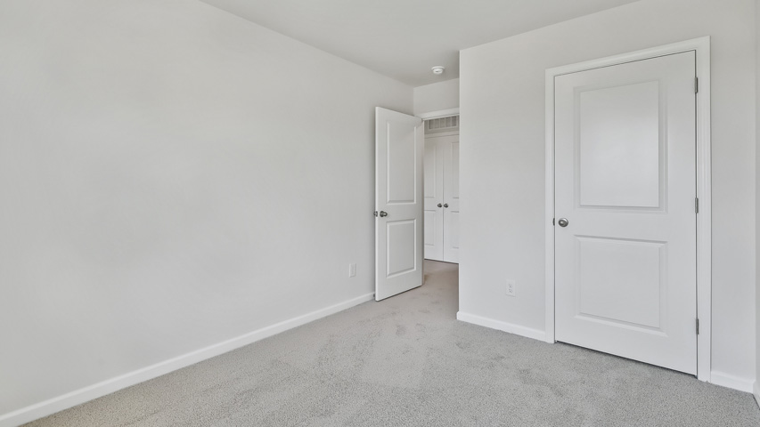 Bedroom with carpet flooring