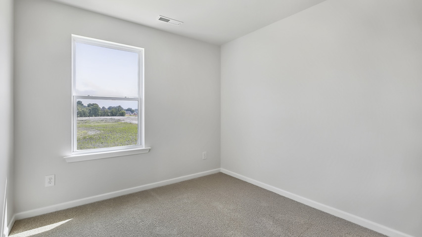 Bedroom with carpet flooring