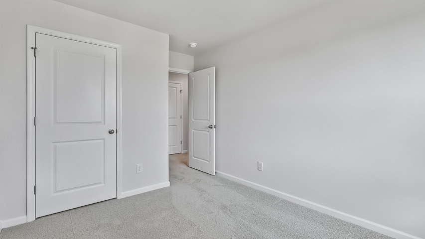 Bedroom with carpet flooring