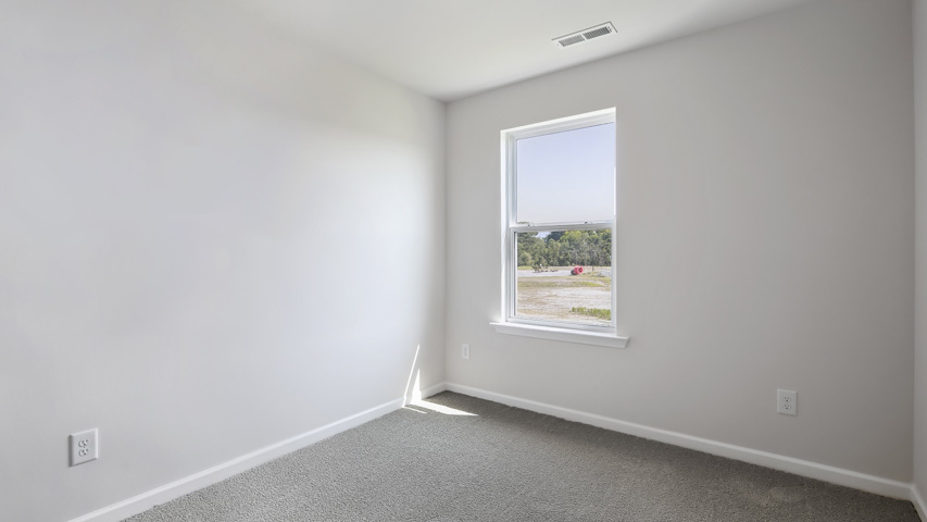 Bedroom with carpet flooring