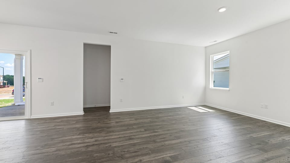 open concept living space with large windows