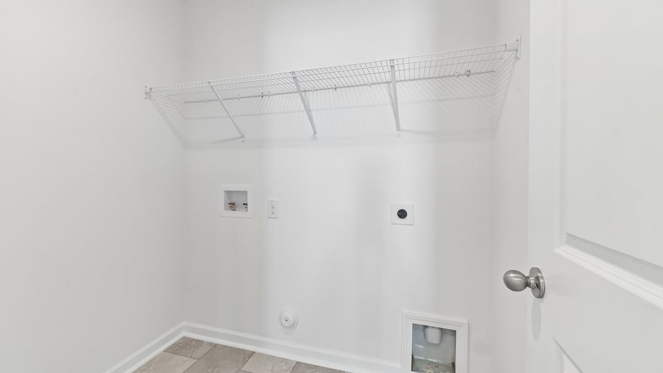 laundry room with wire shelving