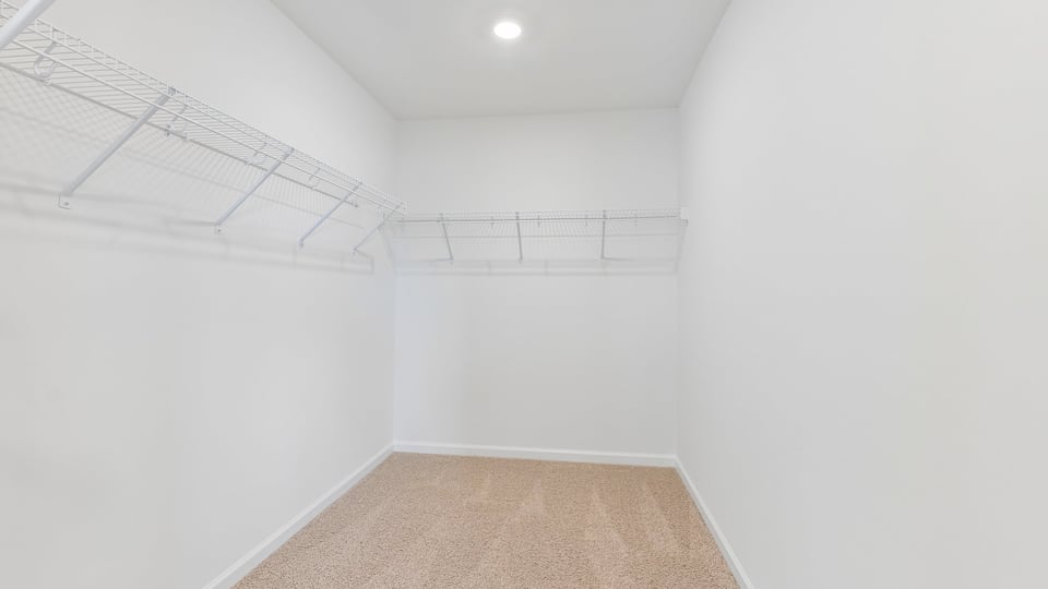 walkin closet with wire shelving