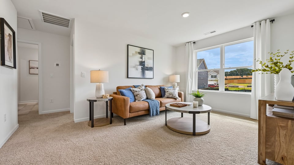 loft with carpet flooring
