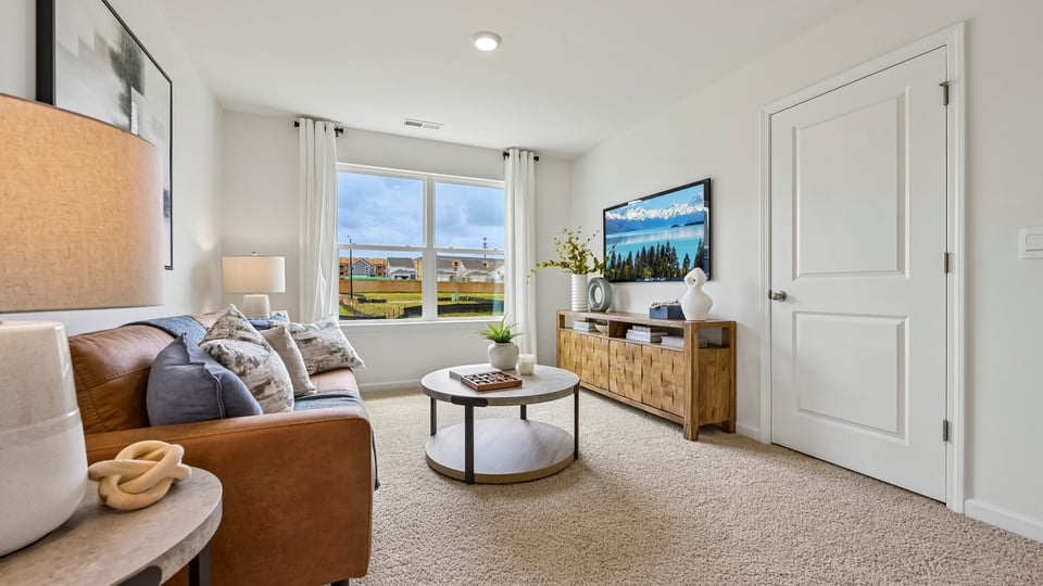 loft with carpet flooring
