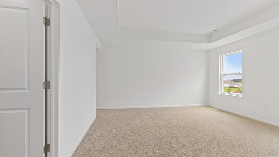 PRIMARY SUITE BEDROOM