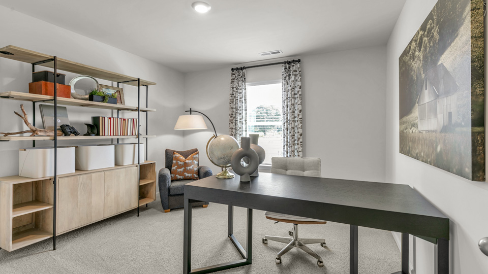 bedroom or home office with carpet flooring