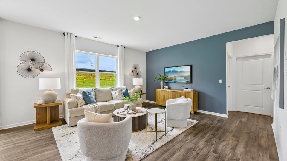 living room with revwood flooring