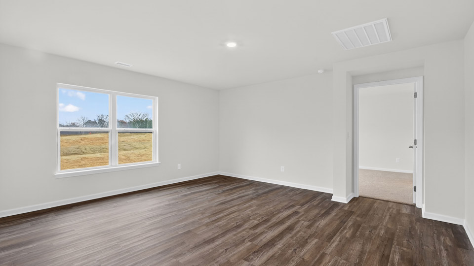 open concept living space with large windows