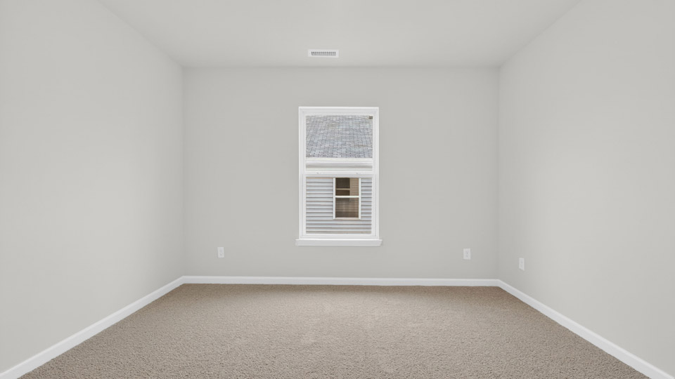 additional bedroom with window, carpeting, closet