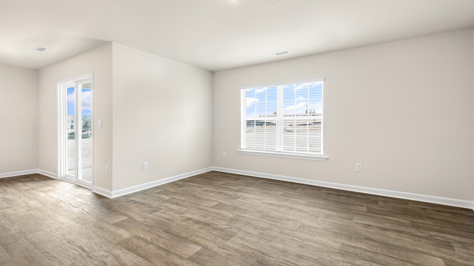 open concept living space with large windows