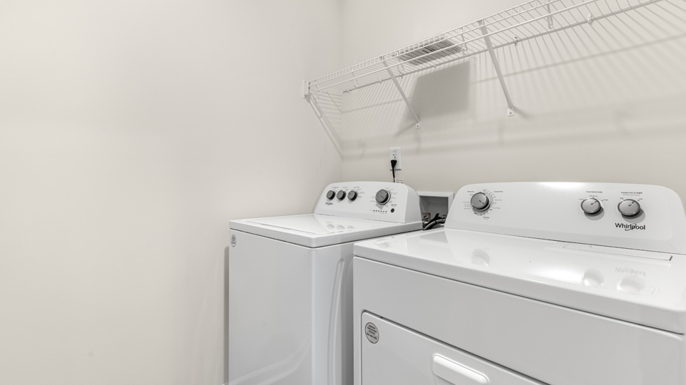 laundry room with wire shelving