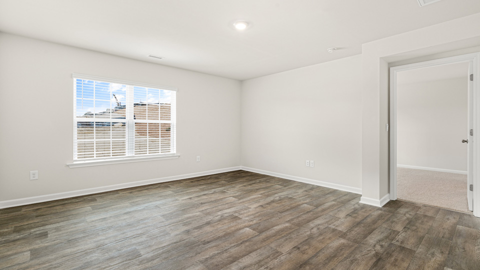 open concept living space with large windows