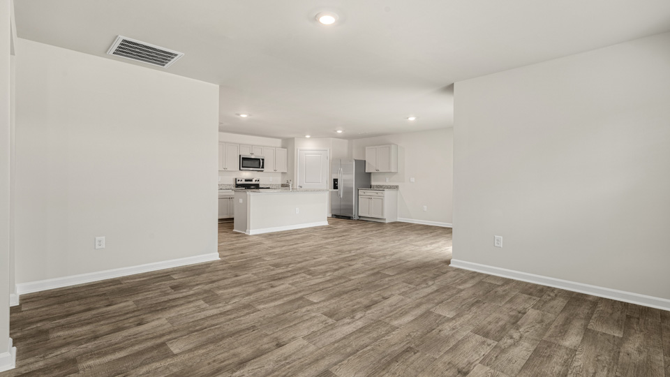 open concept living space with large windows