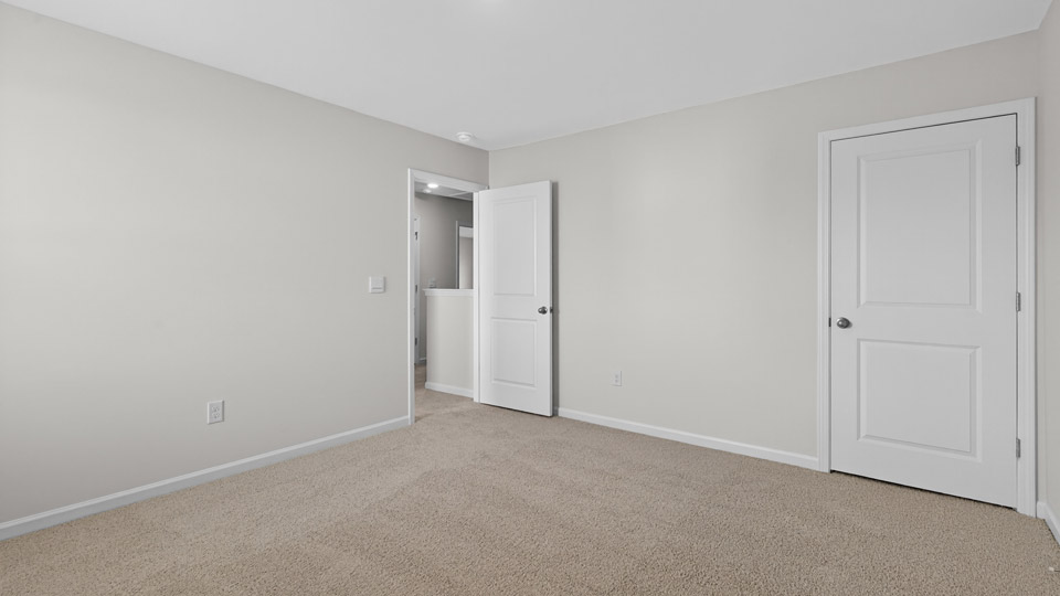 Bedroom with carpet floor and closet