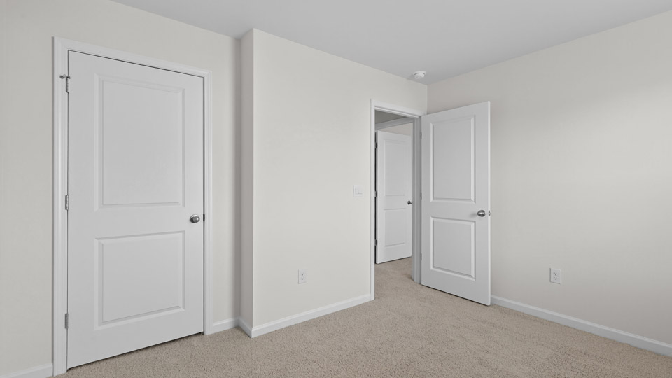 Bedroom with carpet floor and closet