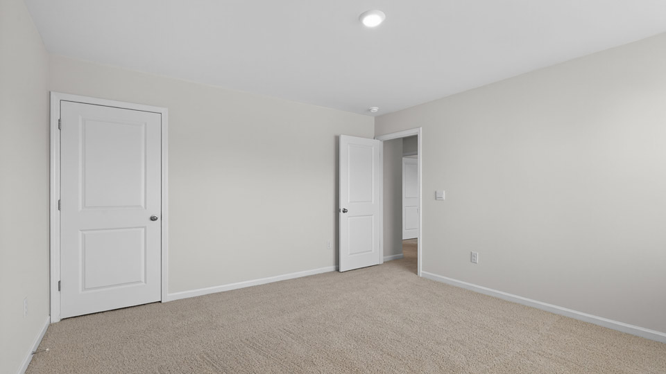 Bedroom with carpet floor and closet