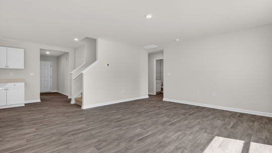 living room with revwood flooring