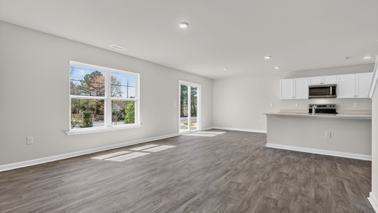 breakfast area next to kitchen with sliding glass doors