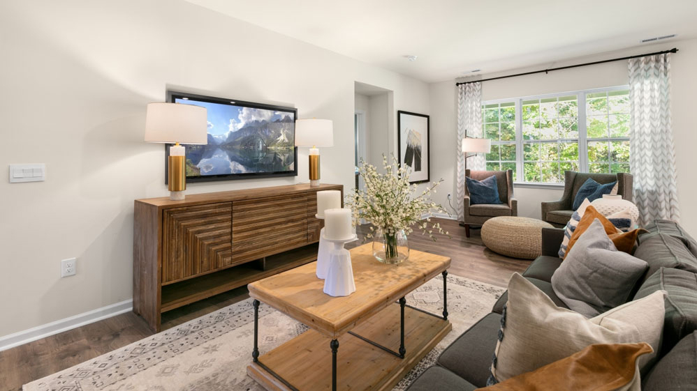 living room with revwood flooring