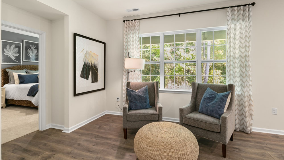 sitting area with revwood flooring