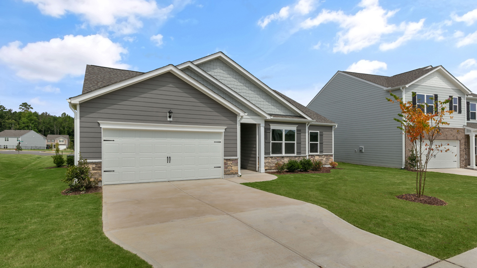 front exterior of booth j with 2 car garage