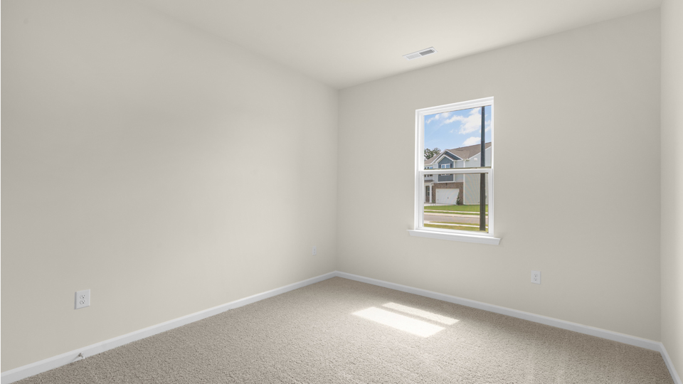 additional bedroom with window, carpeting, closet